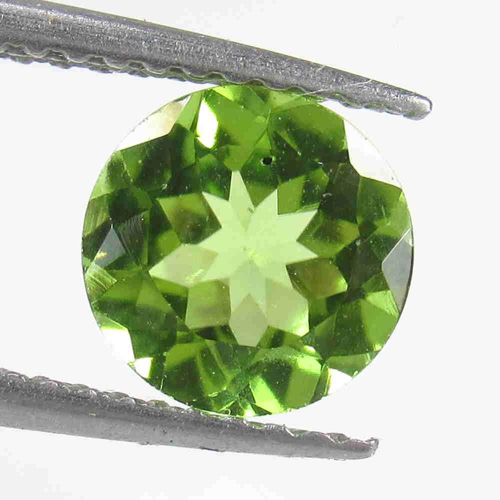 1.35 Ctw Natural Pakistan Peridot Round Cut: Reserve: Title: 1.35 Ctw Natural Pakistan Peridot Round Cut Stone Clarity: VVS Gemstone: Peridot Carat Weight: 1.35 Size/Dimensions: 7.10 x 7.10 x 4.10 mm Additional Information: Top Class Luster / Ex