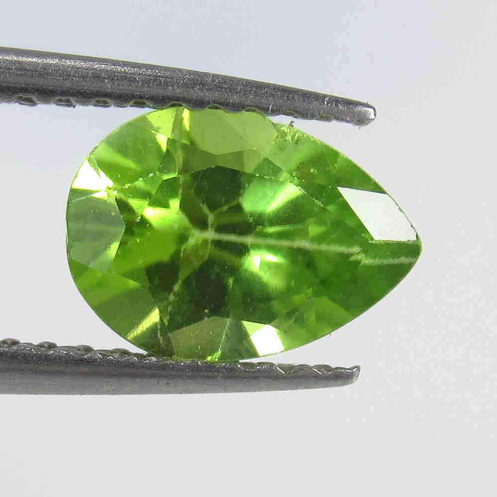1.20 Ctw Natural Pakistan Peridot Pear Cut: Reserve: Title: 1.20 Ctw Natural Pakistan Peridot Pear Cut Stone Clarity: VVS Gemstone: Peridot Carat Weight: 1.20 Size/Dimensions: 8.40 x 6.10 x 4.00 mm Additional Information: Top Class Luster / Exc