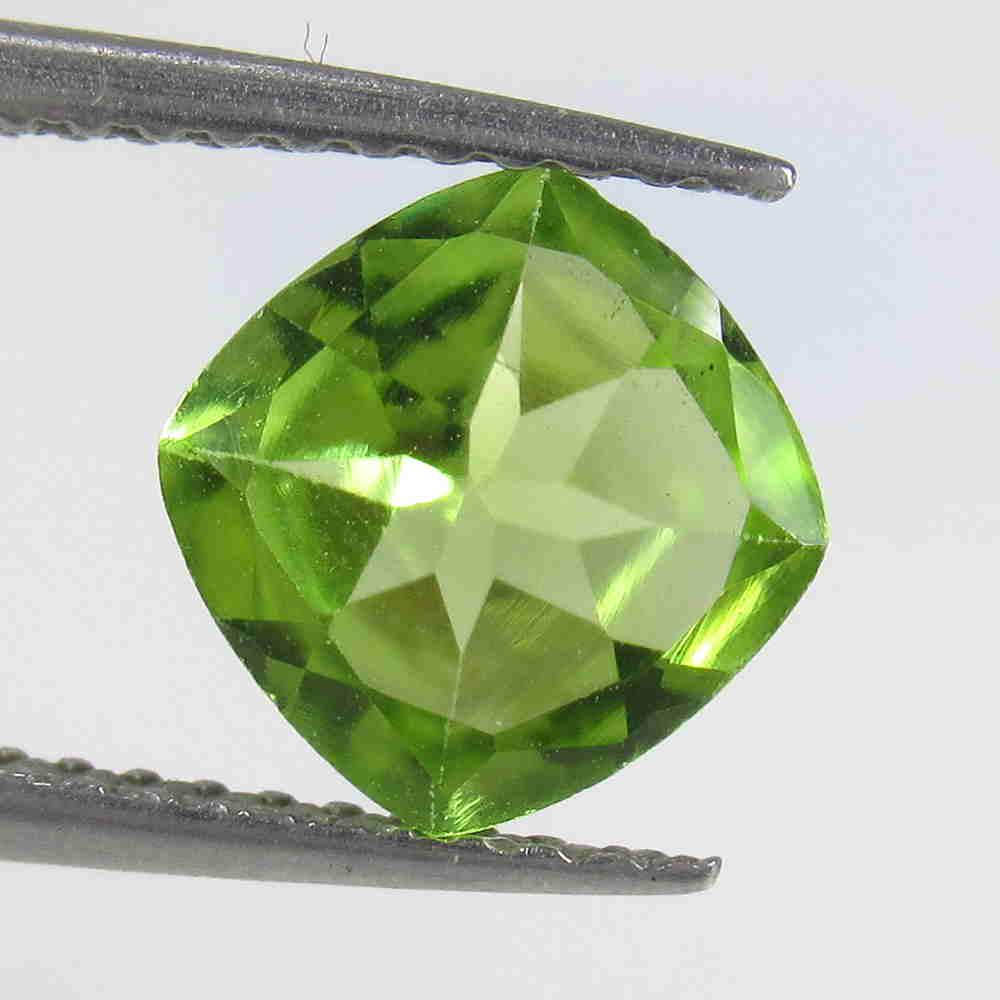 1.19 Ctw Natural Pakistan Peridot Cushion Cut: Reserve: Title: 1.19 Ctw Natural Pakistan Peridot Cushion Cut Stone Clarity: VVS Gemstone: Peridot Carat Weight: 1.19 Size/Dimensions: 6.90 x 6.90 x 3.50 mm Additional Information: Top Class Luster / 
