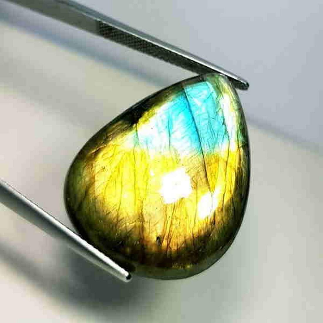 31.95 ct Natural Labradorite: Reserve: Title: 31.95 ct Natural Labradorite Color/Clarity: Opaque Type: Gemstones Carat Weight: 31.95 Size/Dimensions: 28.09 x 22.03 x 7.00 Additional Information: Pear - USA Shipping:<