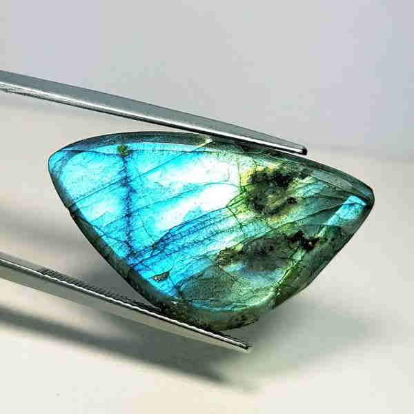 30.33 ct Natural Labradorite: Reserve: Title: 30.33 ct Natural Labradorite Color/Clarity: Opaque Type: Gemstones Carat Weight: 30.33 Size/Dimensions: 30.80 x 18.16 x 7.48 Additional Information: Fancy - USA Shipping: