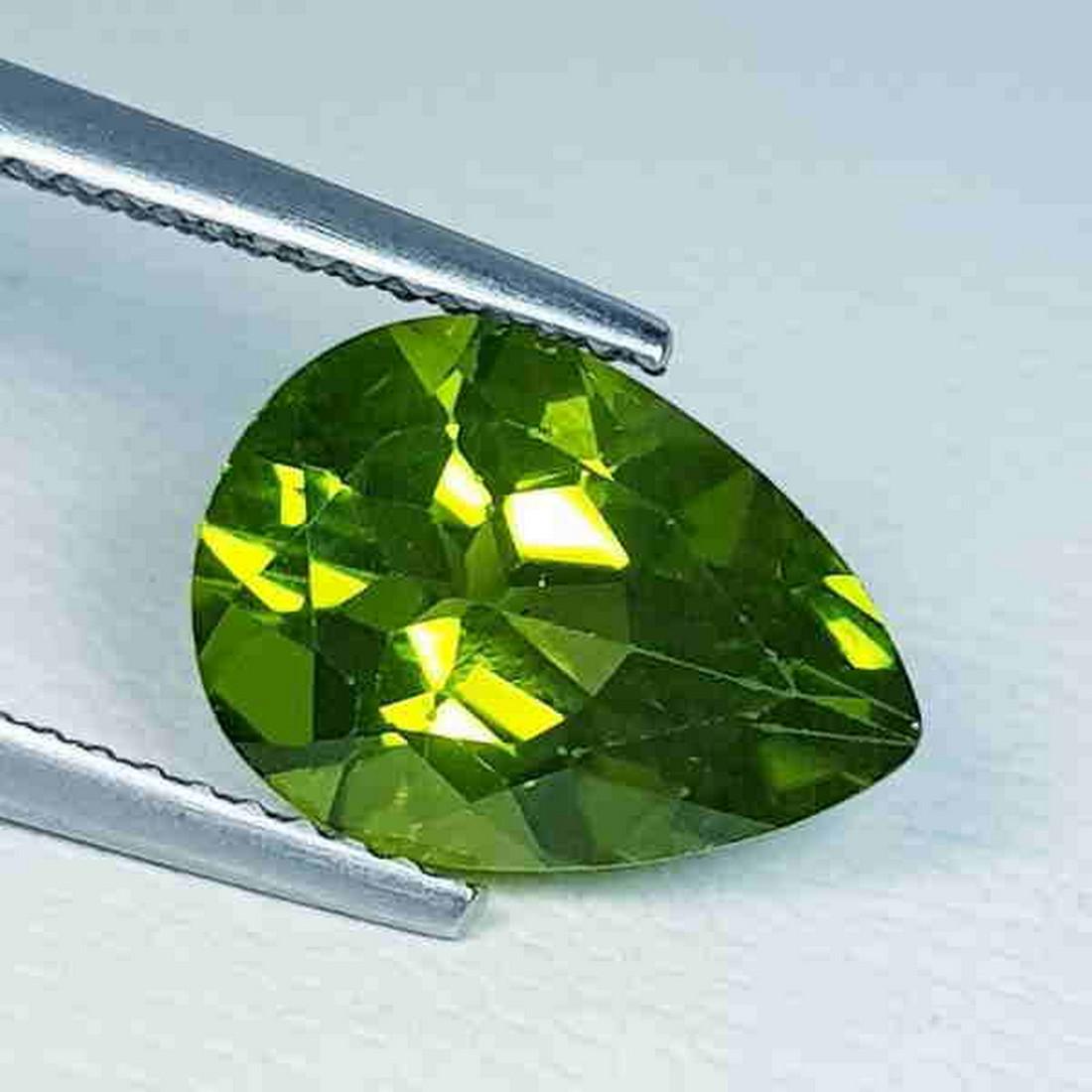 Natural Peridot Pear Cut 3.93 ct: Reserve: Title: Natural Peridot Pear Cut 3.93 ct Color/Clarity: VVS Type: Gemstones Carat Weight: 3.92 Size/Dimensions: 12.00 x 8.70 x 6.00 Additional Information: Pear - Pakistan Shipping:<