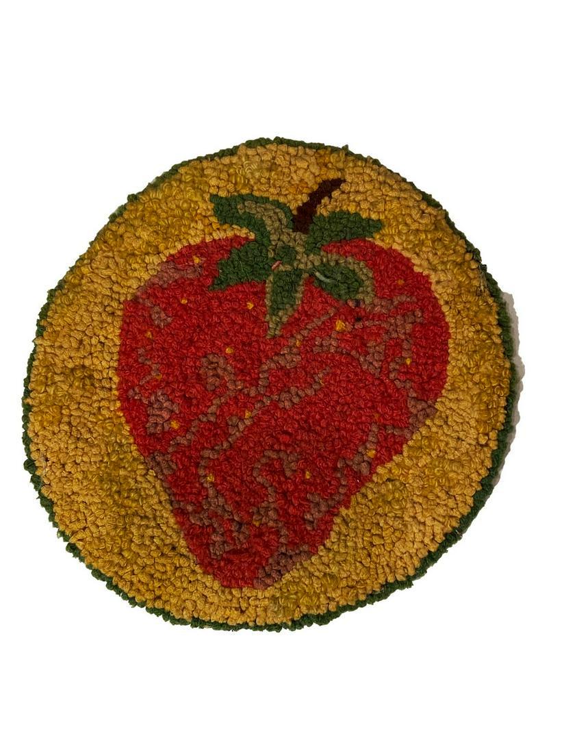 Lamp Coaster: Title: Lamp Coaster Dimension: 7” diam. Provenance/Additional Info: A hooked wool lamp coaster. The coaster features a giant strawberry. C. 1920 Shipping: Domestic: Flat-rate of $10.00 to anywhere w