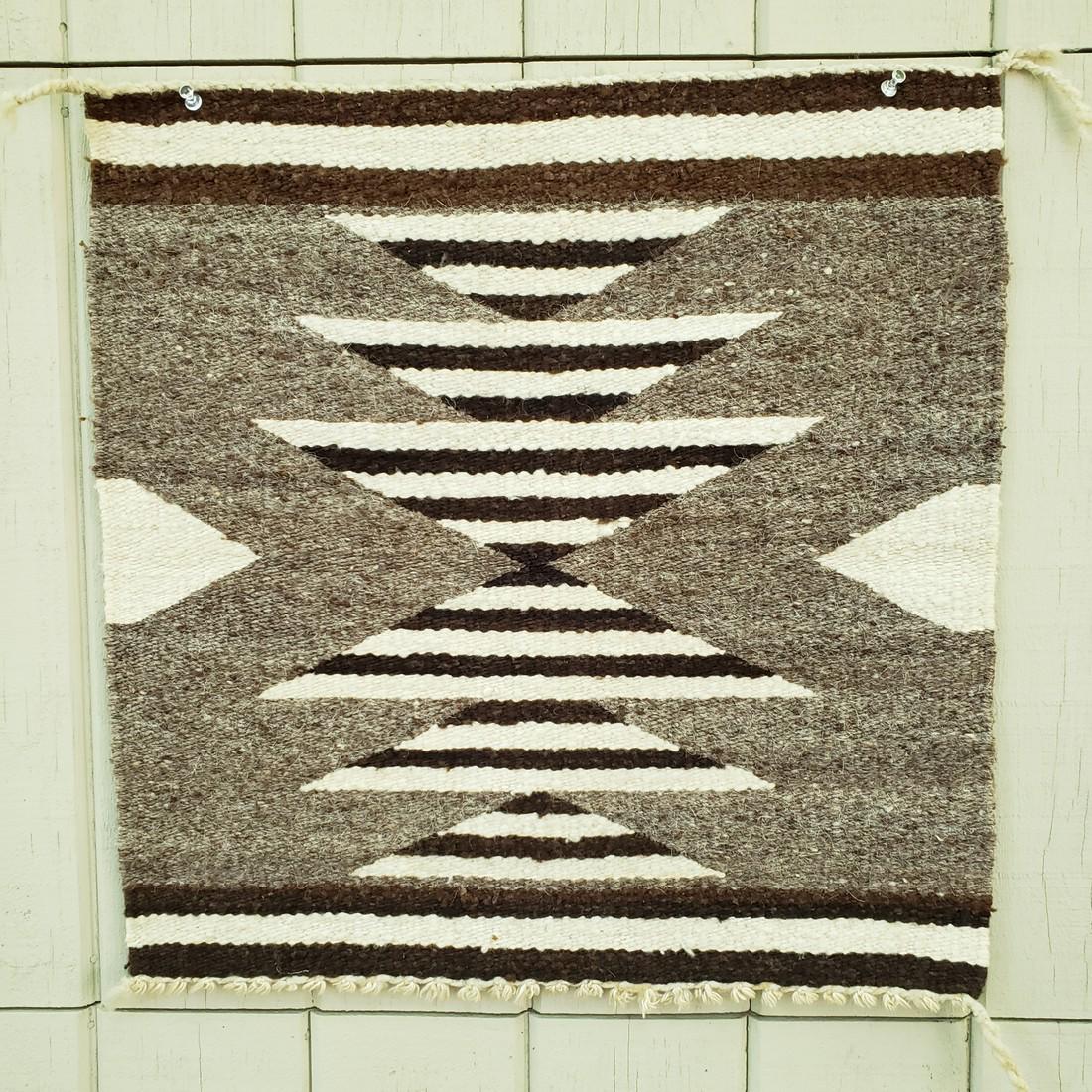 Navajo Woven Natural Wool Sampler Ca 1930's: Title: Navajo Woven Natural Wool Sampler Ca 1930's Dimension: 19 1/2" square Decsription: A graphic, monochromatic natural wool colors sampler in excellent condition. A very bold pattern. Shipping: Do