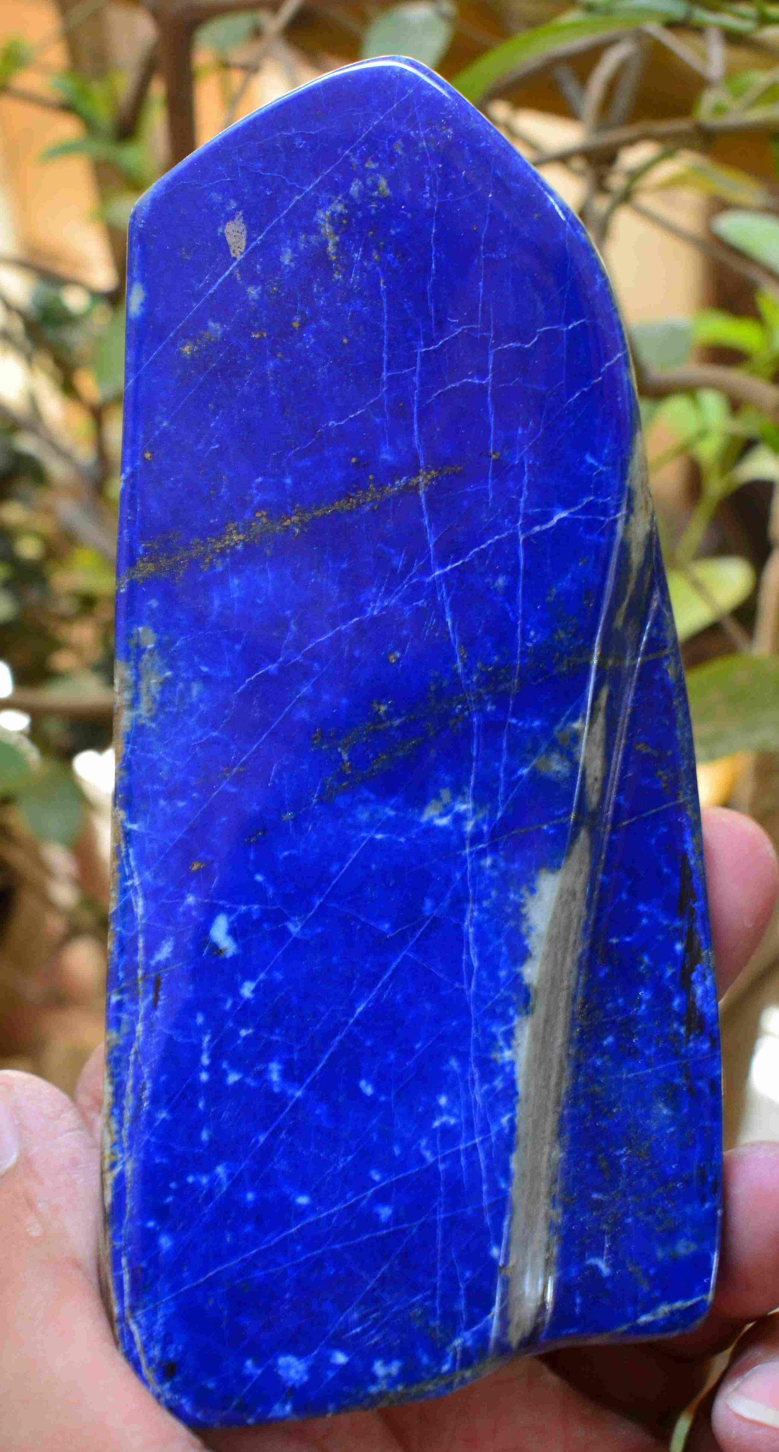 560 Grams Natural Lapis Lazuli Tumble: Title: 560 Grams Natural Lapis Lazuli Tumble Origin: Afghanistan Weight: 560 Grams Size/Dimensions: 150x67x25 MM Description: Natural Reserve: $50.00 Shipping: Domestic: Flat-rate of $30.00 to anywher