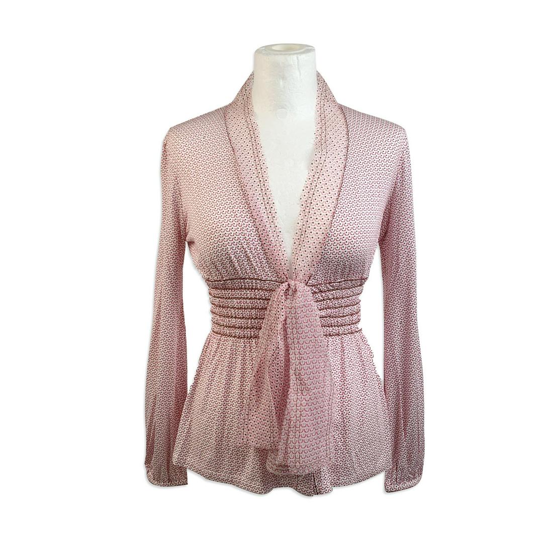 Fendi Pink Viscose Long Sleeve Top with Chiffon Trim: Fendi long sleeve top. The top features a deep v-necklin with a silk chiffon trim chiffon bow detailing on the front elasticated waistline and button placket on the front Composition: 92% rayon 8% ela