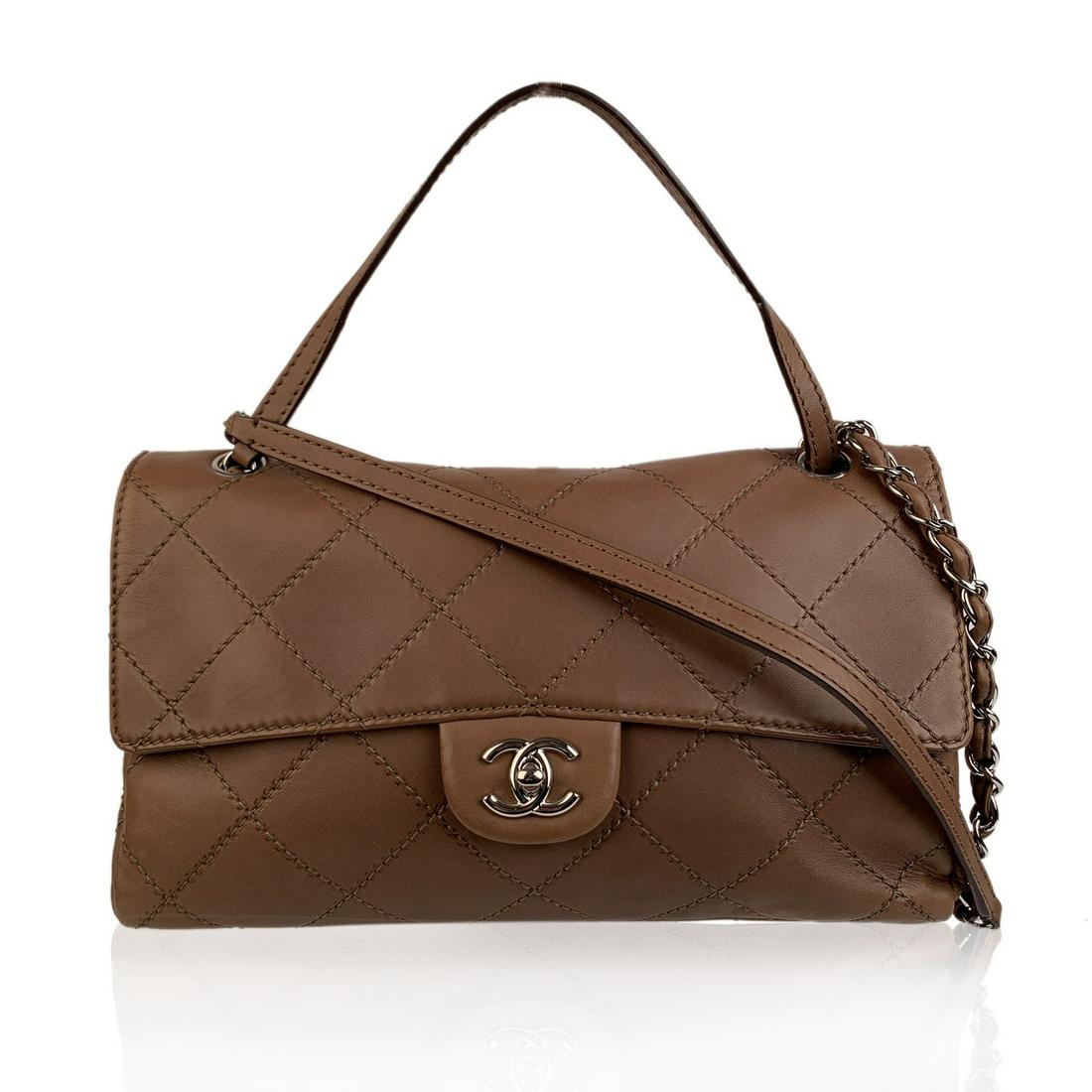Chanel Light Brown Quilted Leather Embossed Stitch Flap: Chanel Flap shoulder bag crafted in light brown embossed leather with Chanels' diamond quilted design. Silver-tone hardware chain-link shoulder straps signature CC turn-lock's closure's at the front f