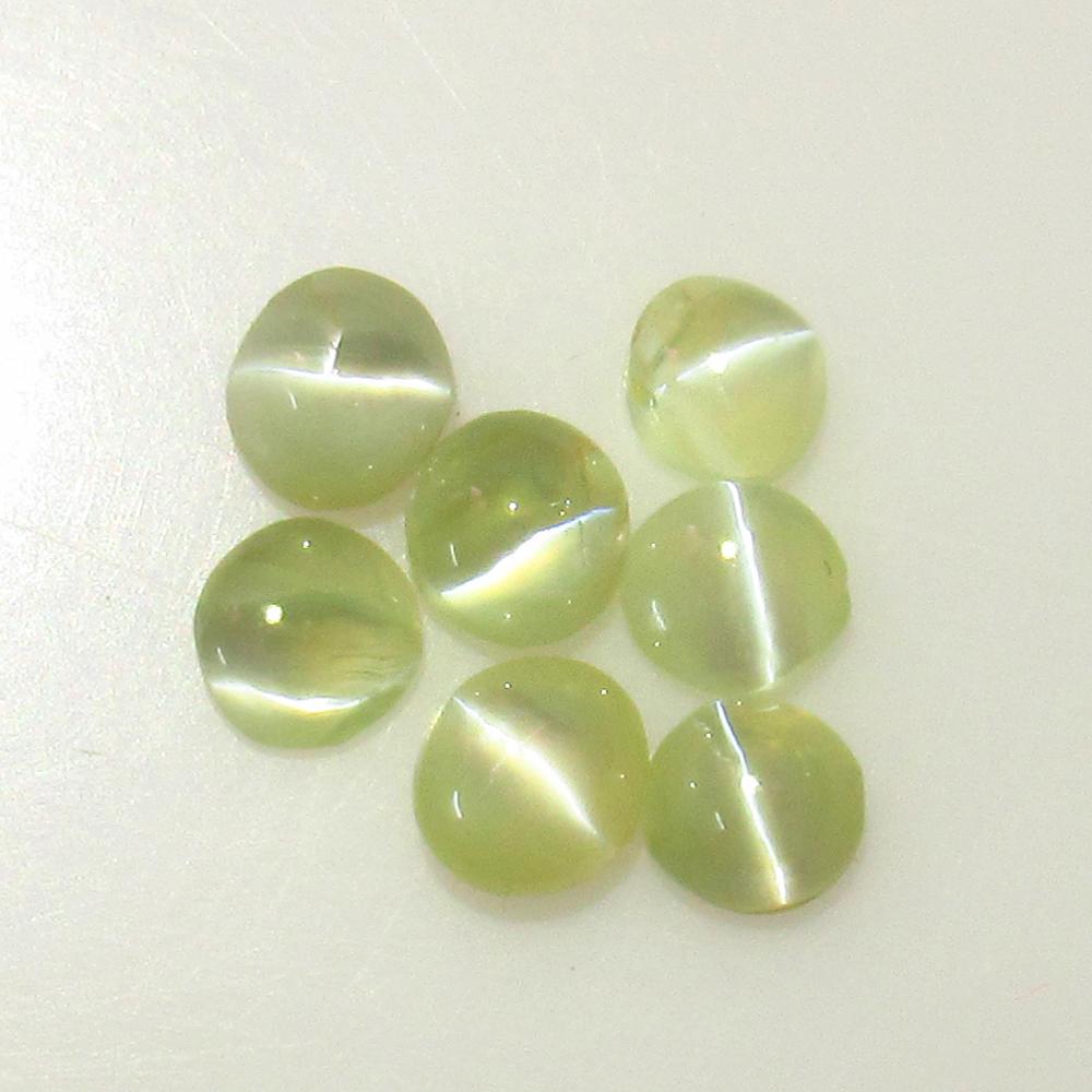 4.12 Ct Natural 7 Chrysoberyl Catseye Round Set: Title: 4.12 Ct Natural 7 Chrysoberyl Catseye Round Set Stone Clarity: Transparent Gemstones: Natural Chrysoberyl Catseye Round Carat Weights: 4.12 Size/Dimensions:4.40 - 5.10 mm / 7 PC's Additional In