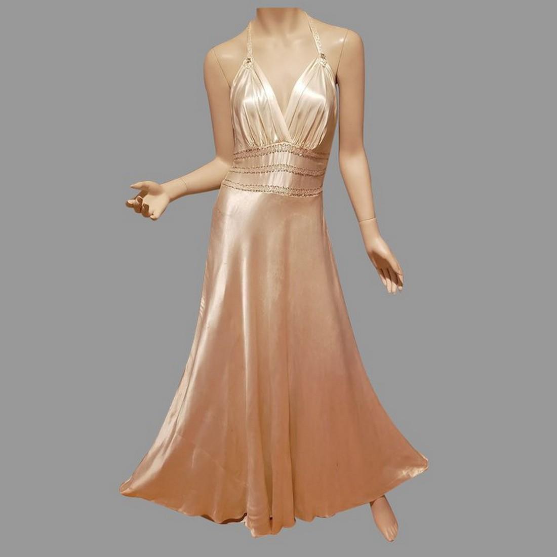 1930 Satin Plunging Old Hollywood Embellished Gown Bias: This is an amazing Old Hollywood Gown from the 1930's silk Satin Peau de Soie it is cut on a Bias and has a small train . There is also heavy embellishment at waist to bodice. all hand embroidered. Si