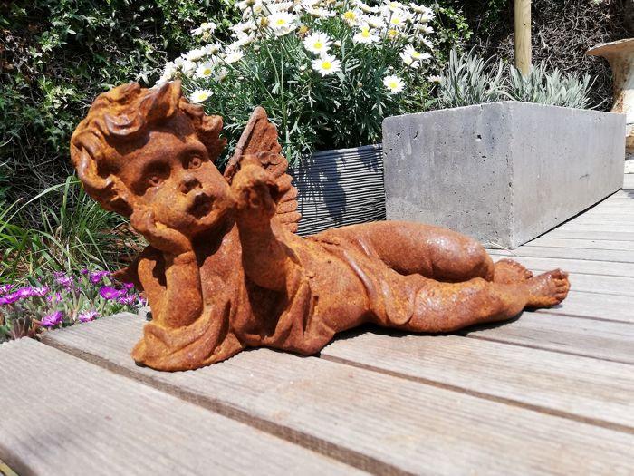 Antique garden sculpture of an Angel (boy): Title: Antique garden sculpture of an Angel (boy) Maker: Unknown Origin: France Date.Period: 20th century Material: Cast iron Size: Width: 32 cm / 12.8 inchHeight: 18 cm / 7.2 inchWeight: 5 KgCast iro