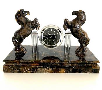Collectible Baltic amber clock with hand carved horses: Title: Collectible Baltic amber clock with hand carved horses 785 gramsMaker: Origin: LithuaniaDate/Period: 20th centuryMaterials:Baltic amberSize:785 grams; base 22cm x 10cm x 3cm; total height