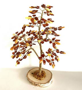 Hand crafted Amber Tree: Title: Hand crafted Amber TreeMaker: Origin: GermanyDate/Period: 20th centuryMaterials:AmberSize:15x15x22 cmDescription:113.0 g Reserve: $120.00 Shipping:Domestic: Flat-rate of $30.00 to anywhere