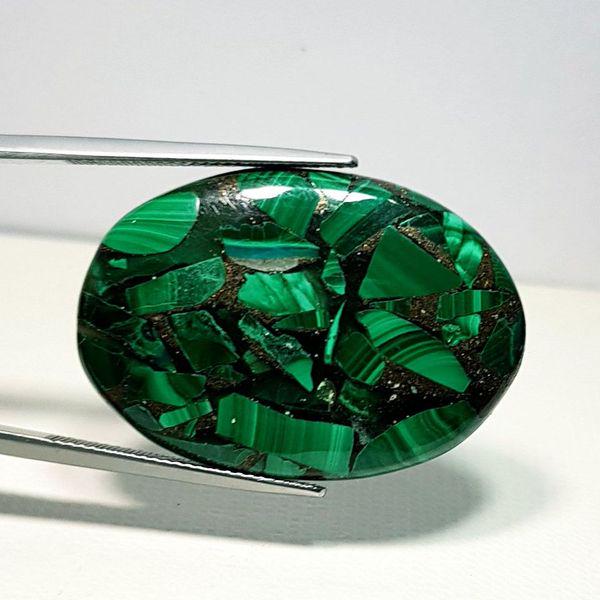 37.13 ct Natural Copper Malachite: No Reserve! Title: 37.13 ct Natural Copper Malachite Color/Clarity: Opaque Gemstones: Loosegemstone Carat Weights: 37.13 Size/Dimensions:34.28 x 23.79 x 4.80 Additional Info:Oval - USA/Egypt Shipping: