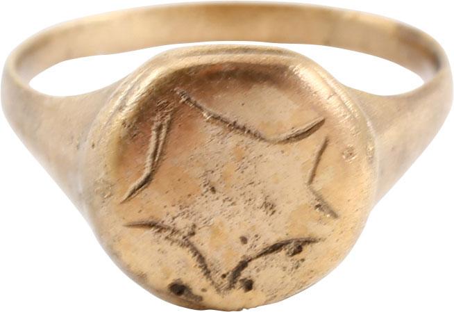 MEDIEVAL SORCERER’S RING 8TH-11TH CENT AD: Size 9 3/4 with 2.0mm rounded face band flaring to the shoulders. Raised circular bezel resembling a stone, cut with a pentagram that evolved from ancient Greek mythology. Sorcery evolved from Pagan r