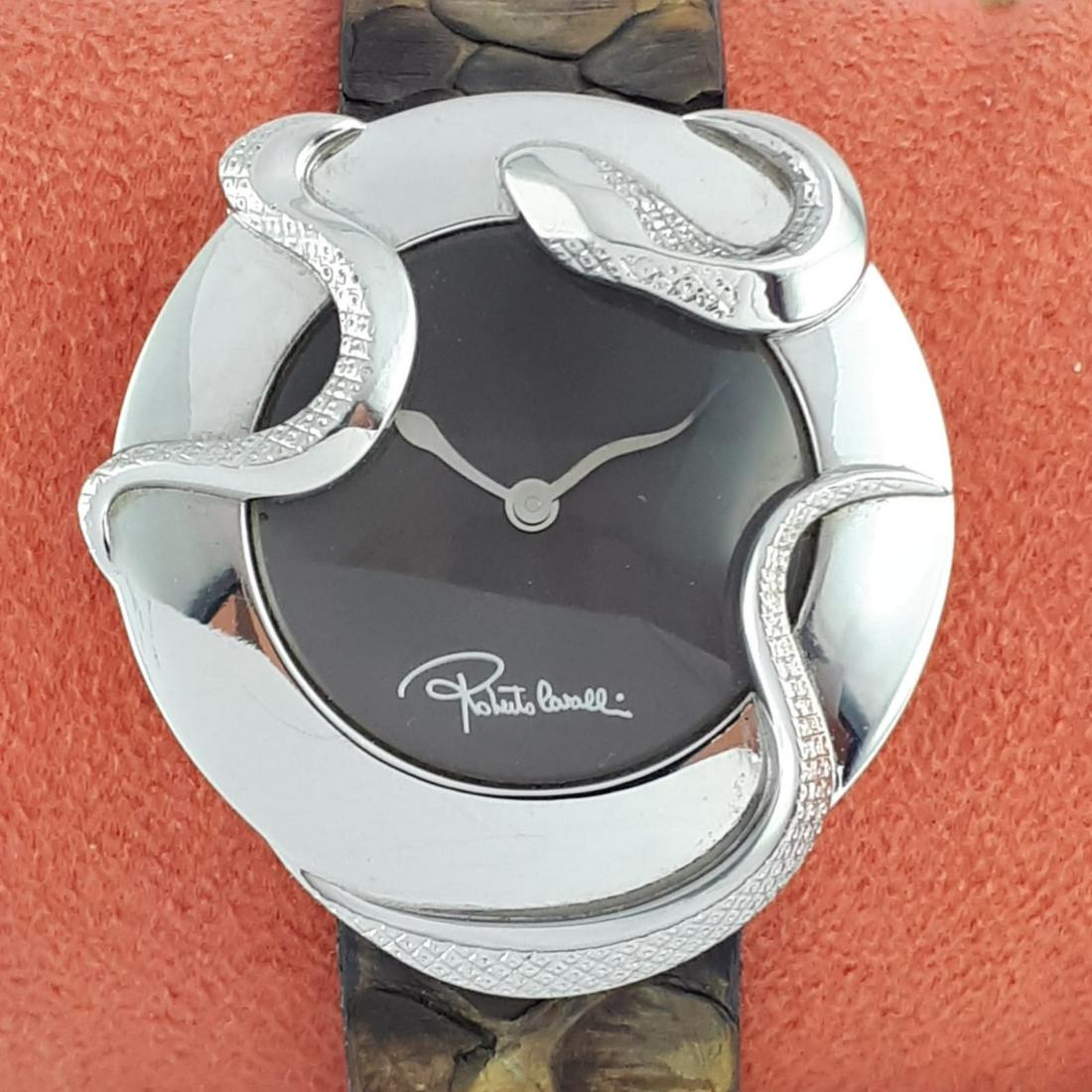 Roberto Cavalli - Ref:50372 - Women - 2011-present: Brand : Roberto CavalliRef : 50372Gender : WomenMovement : QuartzType : Analogue wristwatchTotal Lenght : 19 cm / 7,48 inch (Including Watch Case)Case Size : 37 mm / 1,46 InchBracelet Material : Origi