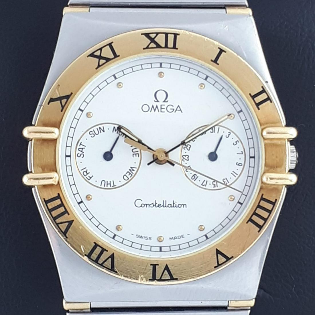 Omega - Constellation Day date - Ref: 396.1070 - Men -: Brand:Omega Model:Constellation Day date Reference Number:Ref: 396.1070 Gender:Men Period:2011-present Movement:Quartz Case material:Gold/Steel Material fineness:18 kt. Type:Analogue wristwatch Shippe
