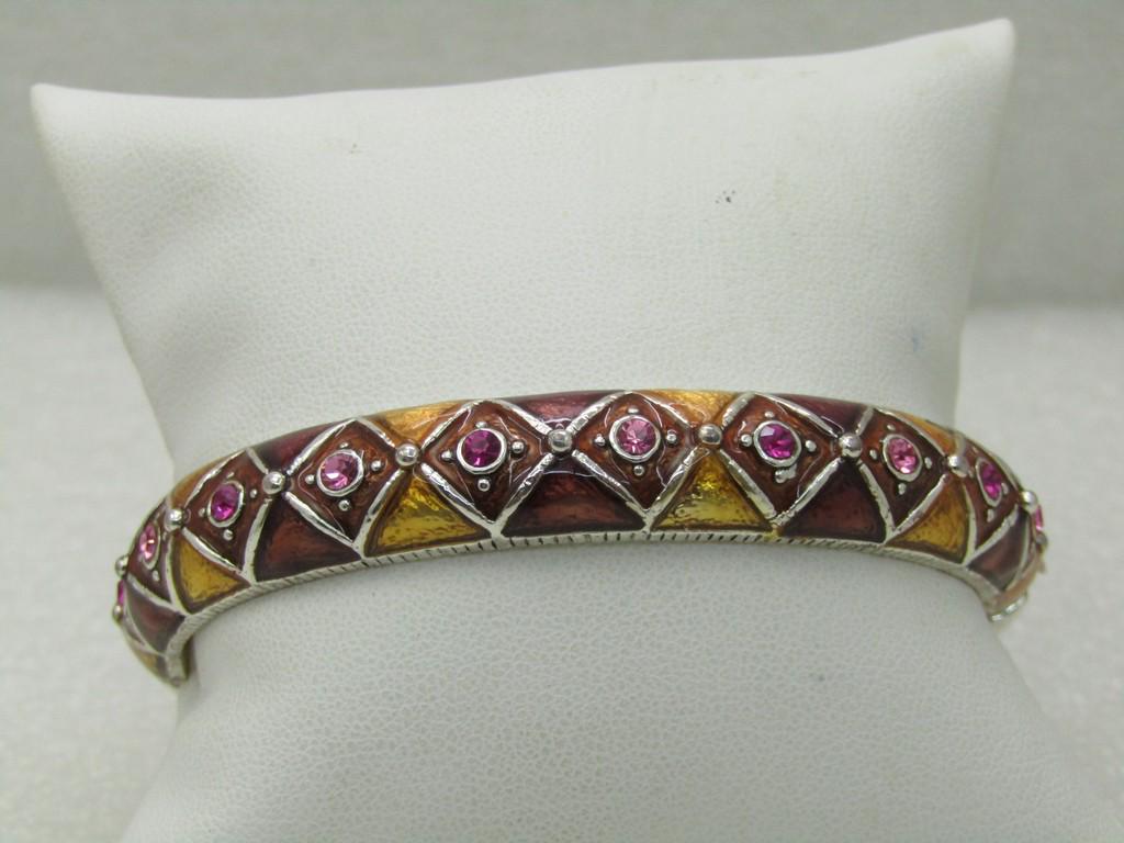 Vintage Enameled & Rhinestone Hinged Bangle Bracelet,: Vintage Enameled & Rhinestone Hinged Bangle Bracelet, 7" with 2.5" by 2.25" opening. Half inch wide, domed with triangular enameled geometric pattern in honey and root beer enameling with centr round 
