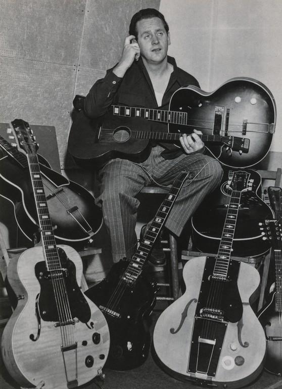 Michael Ochs Archives- Les Paul: Artist: Michael Ochs Archives Title: Les Paul Medium: Photo Litho, 2000, USA Dimensions: 6.6x9.1" Additional Information: Heat Wax Mounted on 8.5x11" Conservation Board. Reserve: $40.00 Shipping: Dome