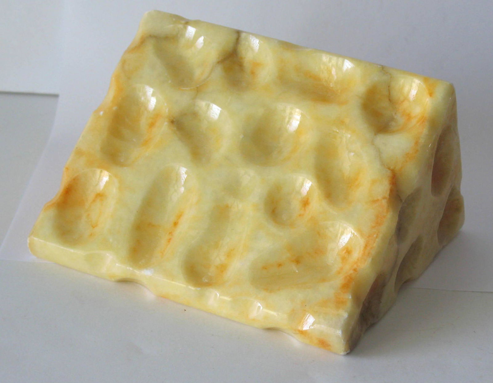 Wedge of vintage stone cheese. (1 of 2)