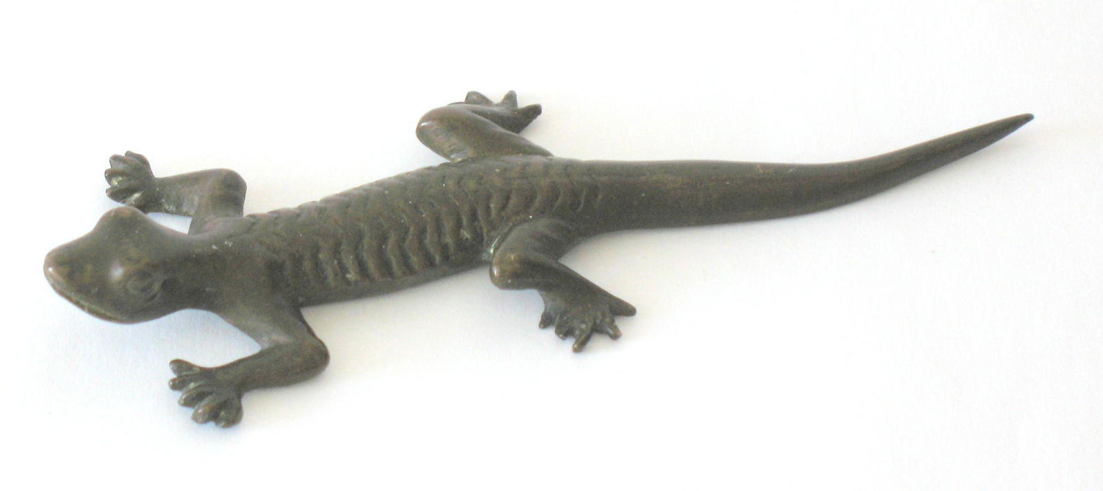 Early brass salamander paper weight. (1 of 2)