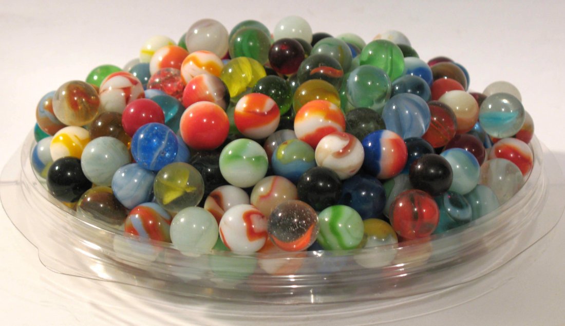 Group of vintage glass marbles: Title: Group of vintage glass marbles Description: Nice group of over 300 vintage glass marbles in great condition. Dimensions: regular size Circa: 1950's Shipping: Domestic: Flat-rate of $20.00 to an