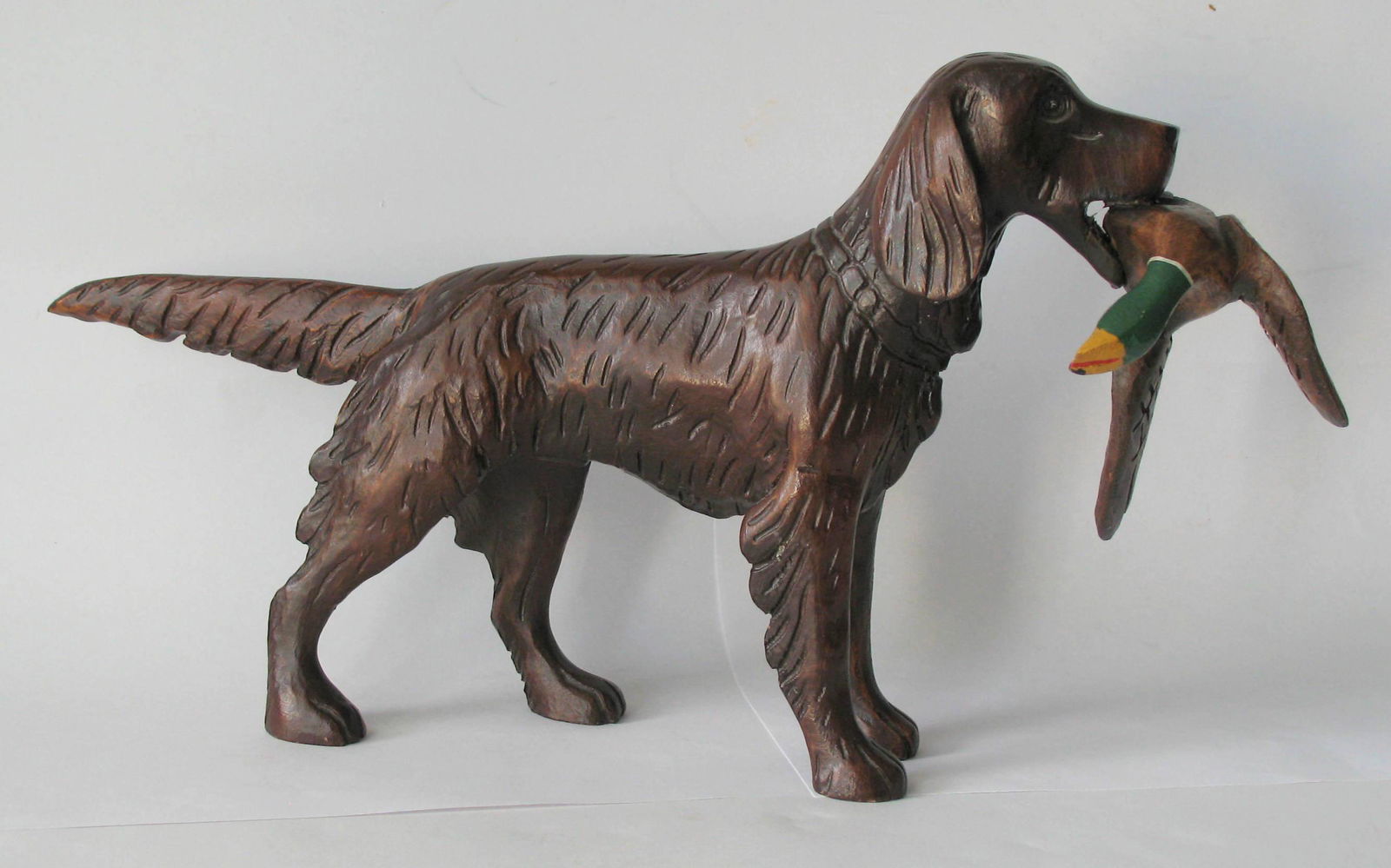 Vintage wood carving dog retrieving a duck. (1 of 5)