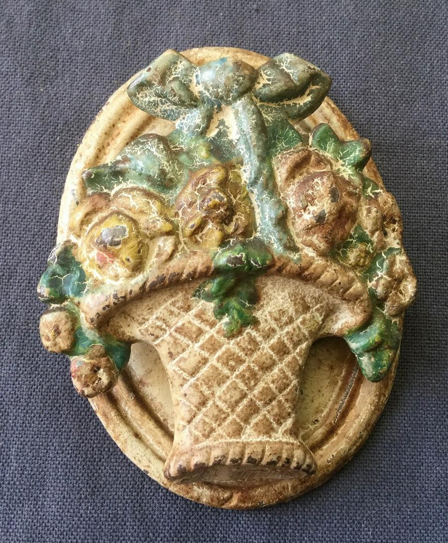 VINTAGE HUBLEY Flower Basket CAST IRON Chamber DOOR: Title: VINTAGE HUBLEY Flower Basket CAST IRON Chamber DOOR KNOCKER in Original Paint Dimension: 3 3/4”x2 7/8”. Provenance/Additional Info: Shipping: Domestic: Flat-rate of $10.00 to anywhere withi