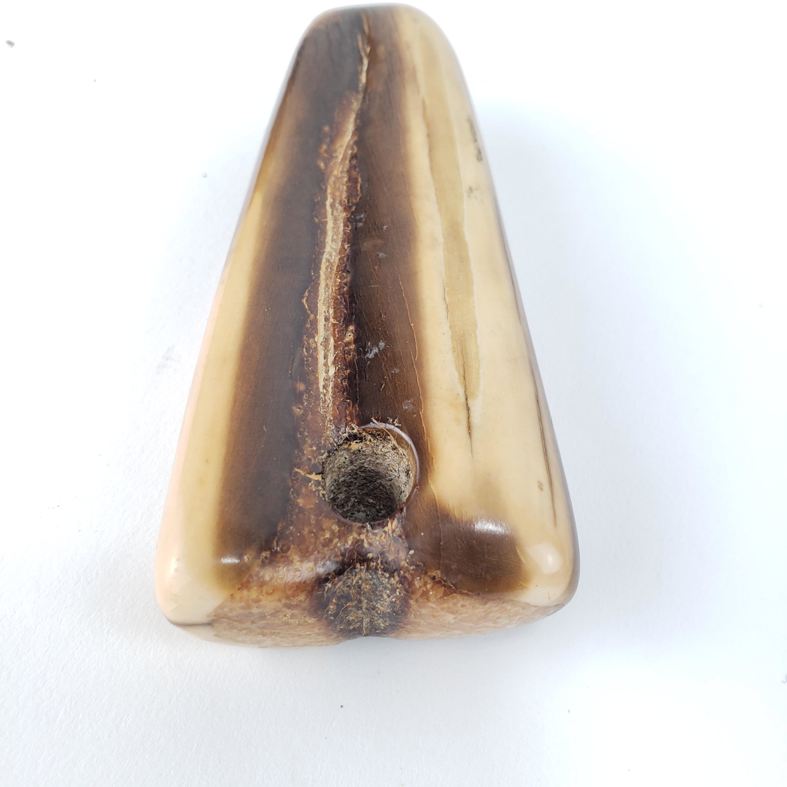Alaskan / Inuit Fishing Sinker, Mammoth Ivory Fishing: Title: Alaskan / Inuit Fishing Sinker, Mammoth Ivory Fishing Lure Date/Period: early 1800s Materials: Mammoth tusk Dimension: 4 1/2" x 1 3/4" x 1" Description: 178 grams. Fishing lure, line sinker car