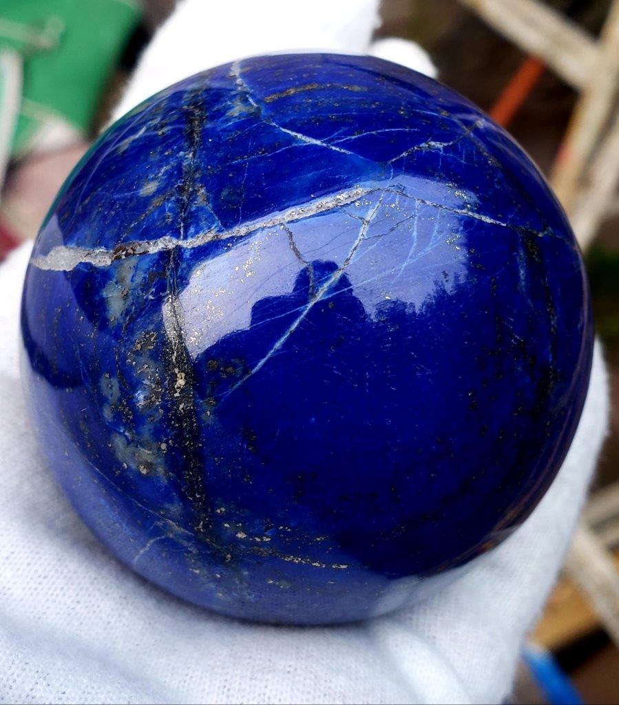Natural Polished Lapis Lazuli Sphere: Title: Lapis Lazuli Polished Tumble Gemstones: Mineral Carat Weights: 2200 Grams Size/Dimensions: 200X130X40 mm Additional Info: Lapis Lazuli Polished Tumble Reserve: $100.00 Shipping: Domestic: Flat-