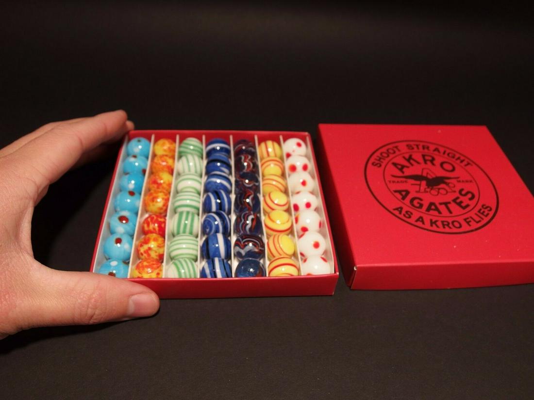 Akro Agates Marble set w Box: 49 5/8" Marbles as shown. Wonderful reproduction set of marbles . Great Set! Reserve: $20.00 Shipping: Domestic: Flat-rate of $8.00 to anywhere within the contiguous U.S. International: Foreign shippi