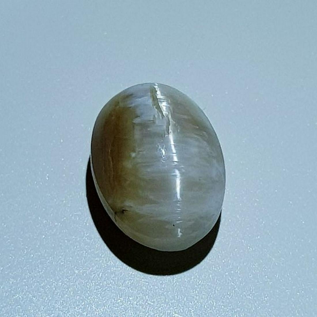 7.30 ct Natural Opal Cat: No Reserve! Title: 7.30 ct Natural Opal Cat's Eye Color/Clarity: Semi Transparent Gemstones: Loosegemstone Carat Weights: 7.3 Size/Dimensions: 13.70 x 10.40 x 9.20 Additional Information: Oval - Afric