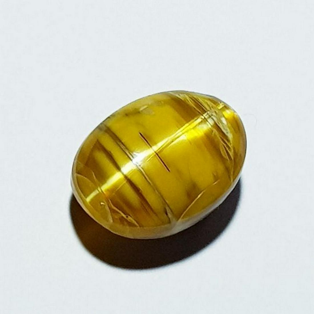 11.46 ct Natural Opal Cat's Eye: No Reserve! Title: 11.46 ct Natural Opal Cat's Eye Color/Clarity: Semi Transparent Gemstones: Loosegemstone Carat Weights: 11.46 Size/Dimensions: 15.40 x 11.70 x 11.00 Additional Information: Oval - A