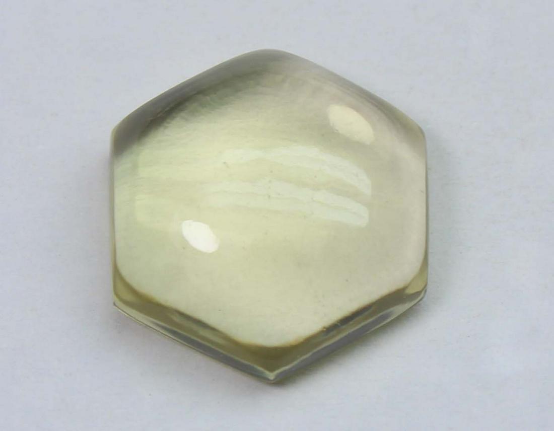 6.05 Cts Natural Lemon Quartz: No Reserve! Title: 6.05 Cts Natural Lemon Quartz Additional Info: Gemstone : Natural Lemon QuartzWeight : 6.05 CtsShape : Fancy CabuchonColour : Greenish Yellow Dimensions : 13.4x13.2x5.2 mmOrigin : A