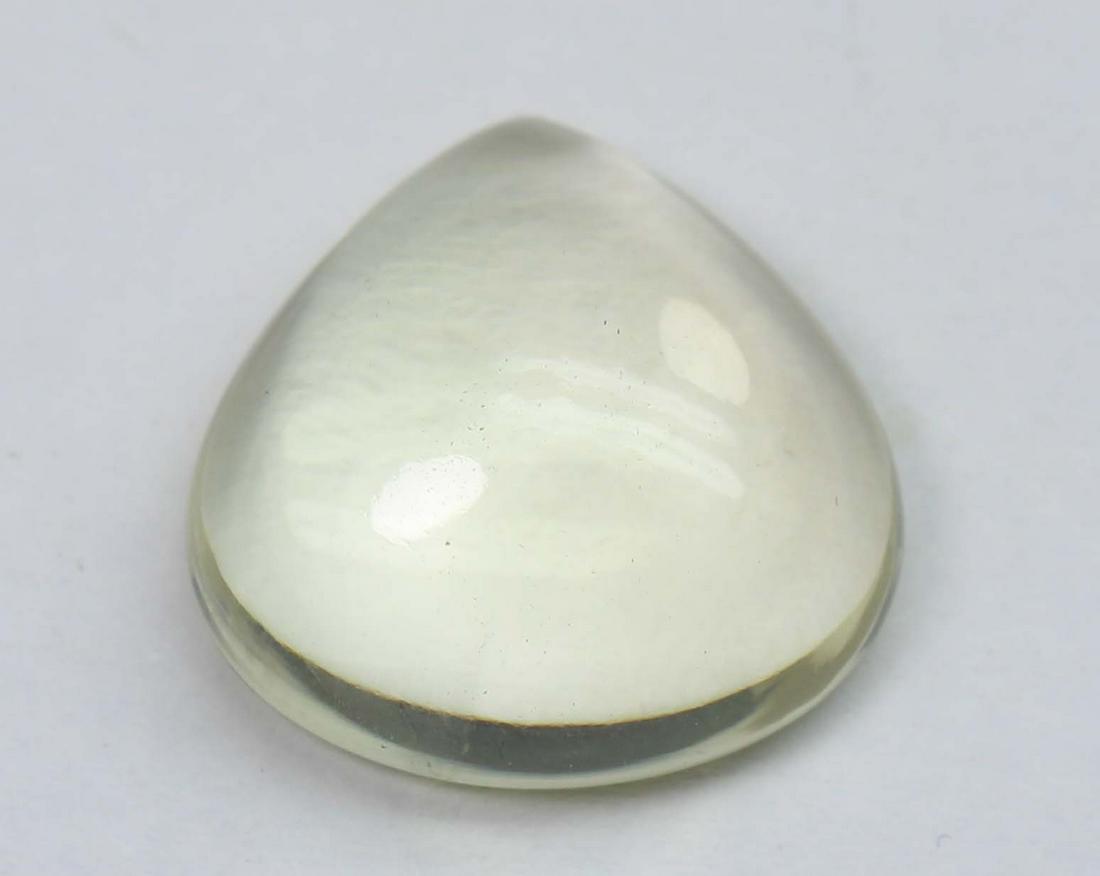 8.86 Cts Natural Lemon Quartz: No Reserve! Title: 8.86 Cts Natural Lemon Quartz Additional Info: Gemstone : Natural Lemon QuartzWeight : 8.86 CtsShape : Pear CabuchonColour : Greenish Yellow Dimensions : 14.7x14.7x6.5Origin : Afric