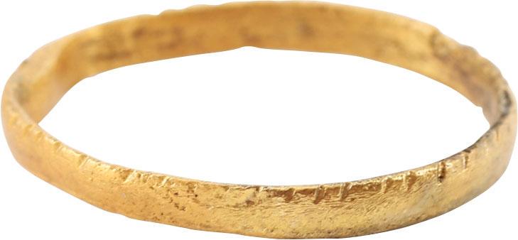 ANCIENT VIKING WEDDING RING 866-1067 AD JEWELRY SZ 6 ¾: Size 6 3/4. 2.1mm band with slightly rounded face. The edge with fine stipple border. The 24 karat gold surface professionally restored. Vikings exchanged rings on the pommel of the groom’s sword. G