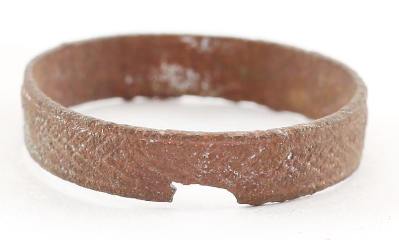 ANCIENT VIKING WEDDING RING C.850-1050 AD SIZE 6 ½.: No Reserve! Flat face band of 3.9mm width with a hand engraved or chiseled checkered medial and narrow edges. Size 6 ½ Good preservation as found with uniform light surface encrustation. Vikings exch