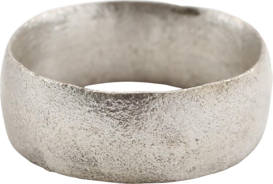 FINE VIKING WEDDING RING C.9TH-10TH CENTURY AD: Size 6 for the small finger as was the custom. Broad 6.5mm width with rounded face. Lightly textured from burial. Professionally refurbished with the pure silver surface restored. Gift boxed with cert