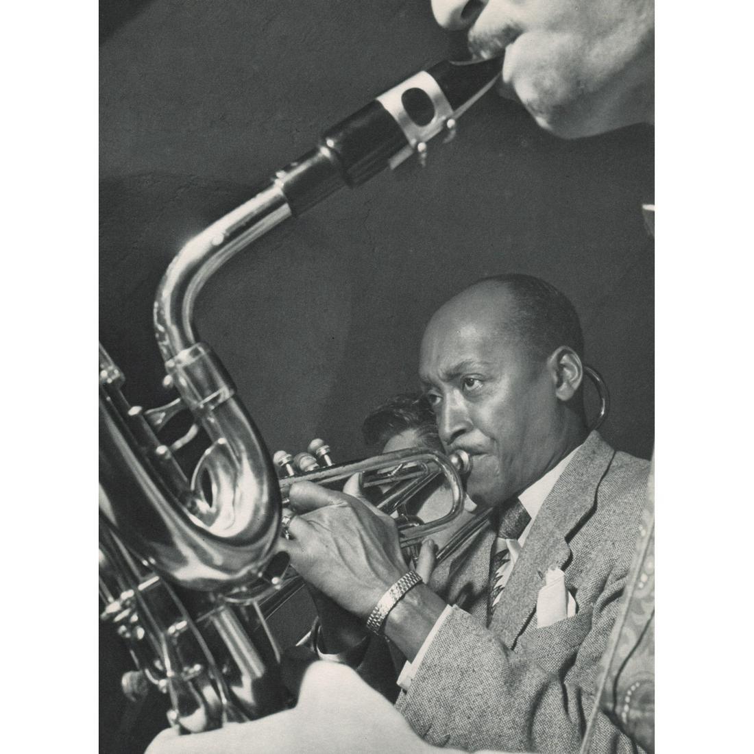 ROBERT DOISNEAU - Bill Collman, Trumpet: Artist: ROBERT DOISNEAU Print Title: Bill Collman, Trumpet Medium: Sheet-fed Gravure Printing Date: 1950's Printed in France Image Size approx: 9 x 6.5 inches Robert Doisneau (1912-1994) was a French