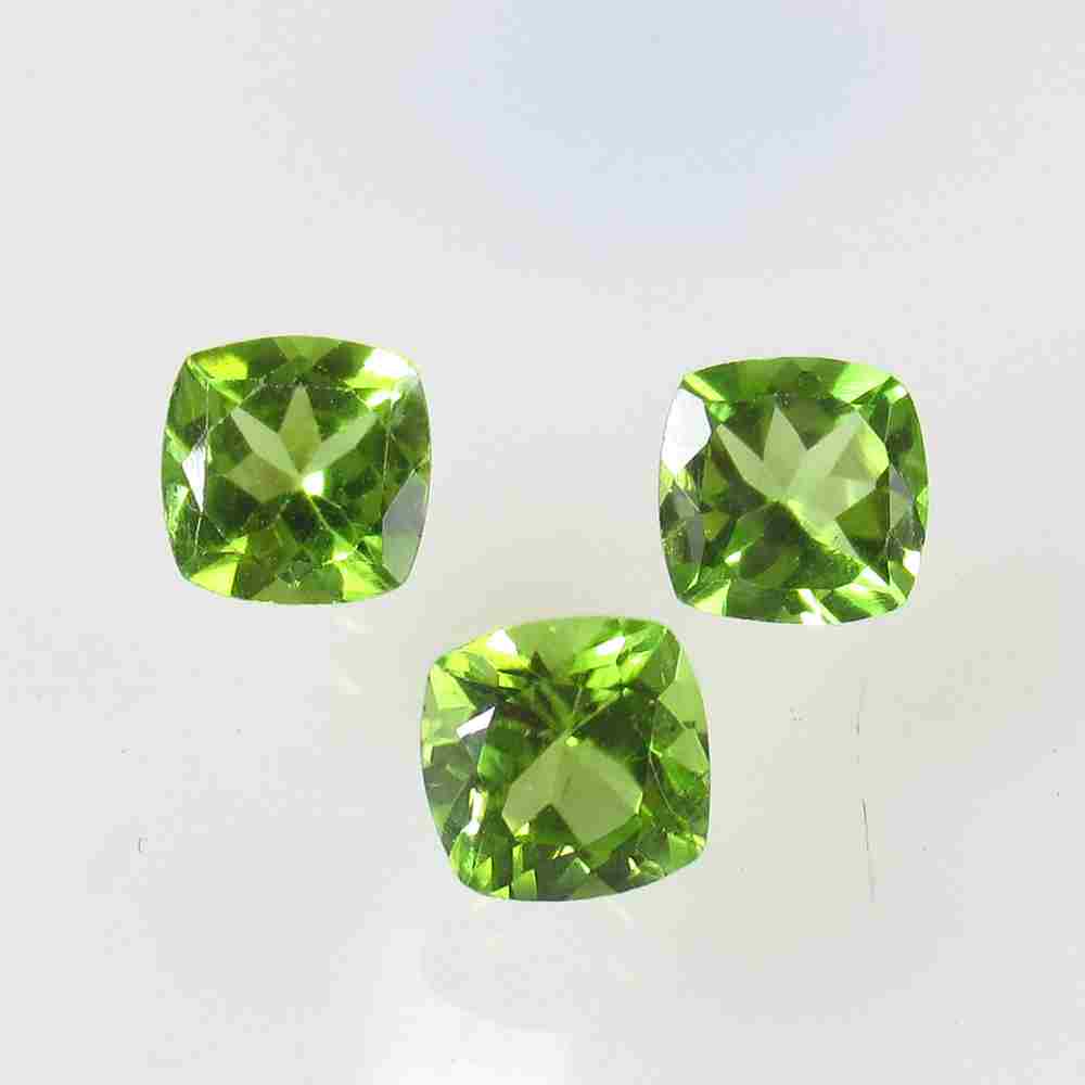 4.59 Ctw Natural 3 Pakistan Peridot Cushion Set: Title: 4.59 Ctw Natural 3 Pakistan Peridot Cushion Set Stone Clarity: VVS Gemstones: Peridot Carat Weights: 4.59 Size/Dimensions: 7.00 x 7.00 x 4.20 mm / 3 PC's Additional Information: Top Class Luste