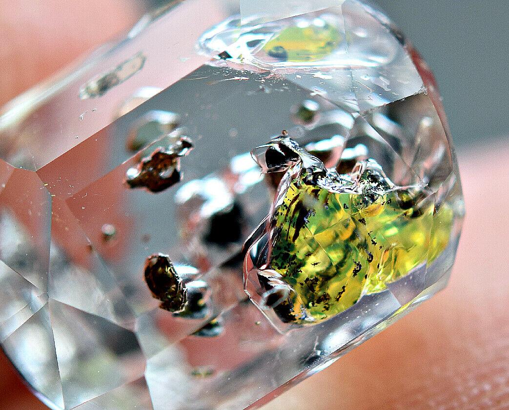 Rare florescent inside petroleum diamond quartz-faceted (1 of 9)