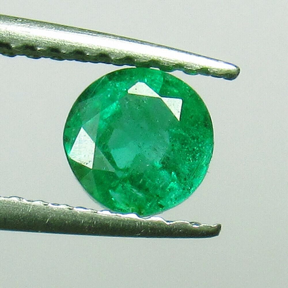 0.66 Ct Natural Zambian Emerald Round Cut (1 of 2)