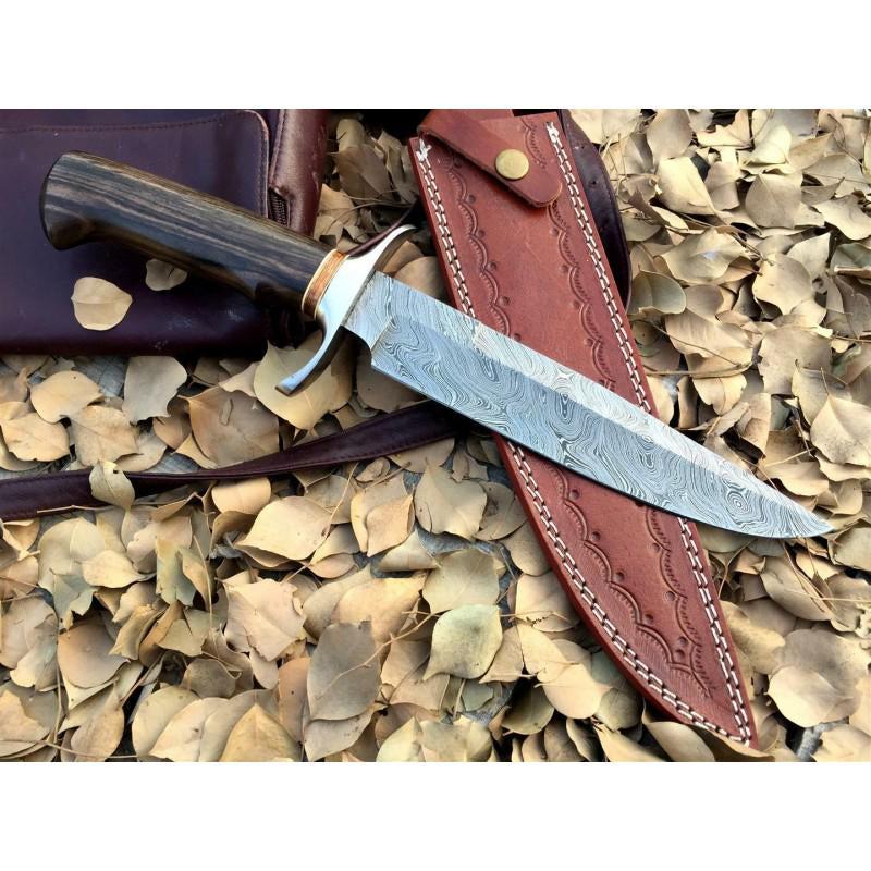 Damascus steel knife, stainless steel bolster handle,: Knife "Bayonet" made of damask steel. Handle – stainless steel bolster & walnut wood, scabbard - original cow leather. Damascus knives are very durable, look great and keep sharpness perfectly. Dama