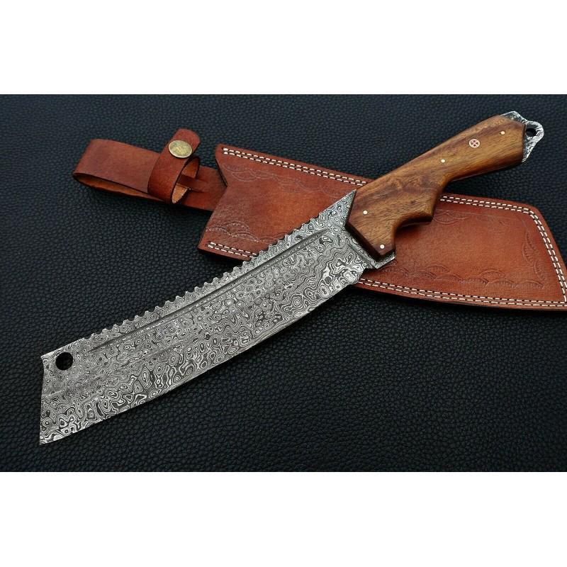 Damascus steel knife, with original cow hide leather: Knife "Tang" made of damask steel. Handle – rose wood, scabbard - original cow hide leather. Damascus knives are very durable, look great and keep sharpness perfectly. Damascus steel has high qualit