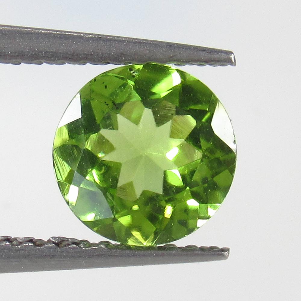1.37 Ct Natural Pakistan Peridot Round Cut: No Reserve! Title: 1.37 Ct Natural Pakistan Peridot Round Cut Clarity: VVS Gemstone: Natural Peridot Carat Weight: 1.37 Size/Dimensions: 7.00 x 7.00 x 4.00 mm Additional Information: Top Class Luster 
