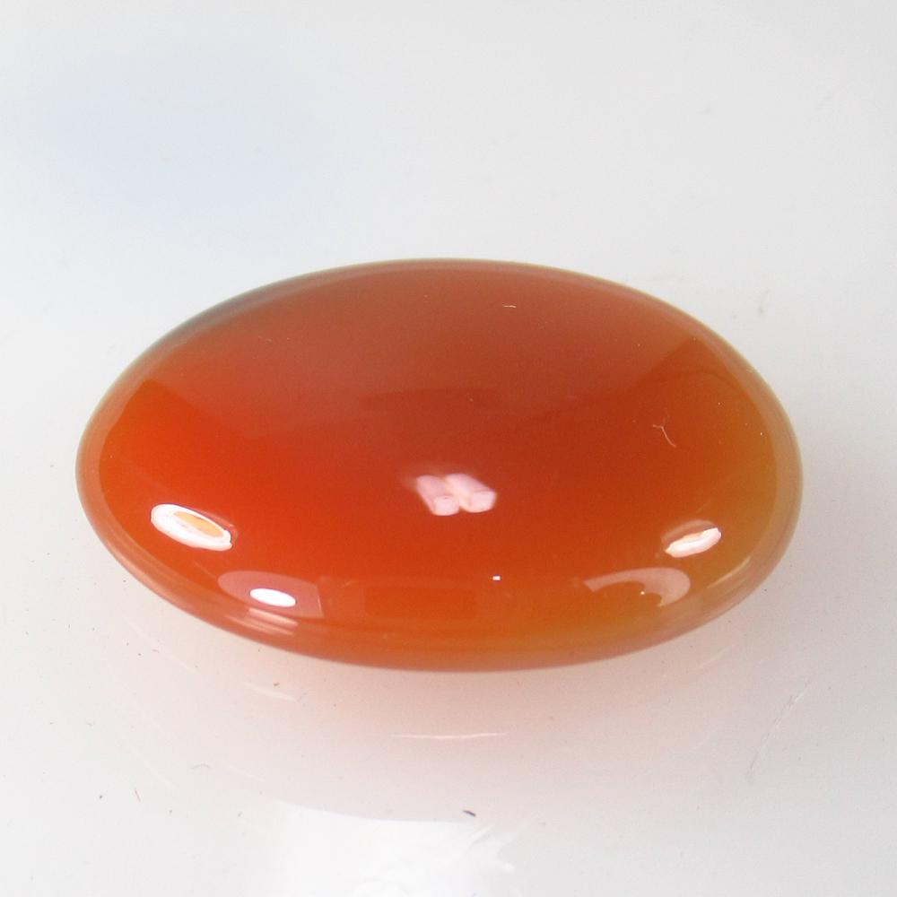 14.66 Ct Natural Carnelian Oval Cabochon: No Reserve! Title: 14.66 Ct Natural Carnelian Oval Cabochon Clarity: Semi-Transparent Gemstone: Natural Carnelian Carat Weight: 14.66 Size/Dimensions: 22.00 x 18.70 x 4.70 mm Additional Information: E