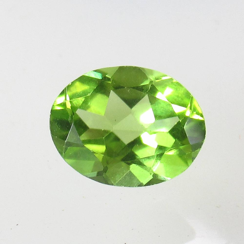 1.75 Ct Natural Pakistan Peridot Oval Cut: No Reserve! Title: 1.75 Ct Natural Pakistan Peridot Oval Cut Clarity: VVS Gemstone: Natural Peridot Carat Weight: 1.75 Size/Dimensions: 9.00 x 7.00 x 4.20 mm Additional Information: Top Class Full Lus