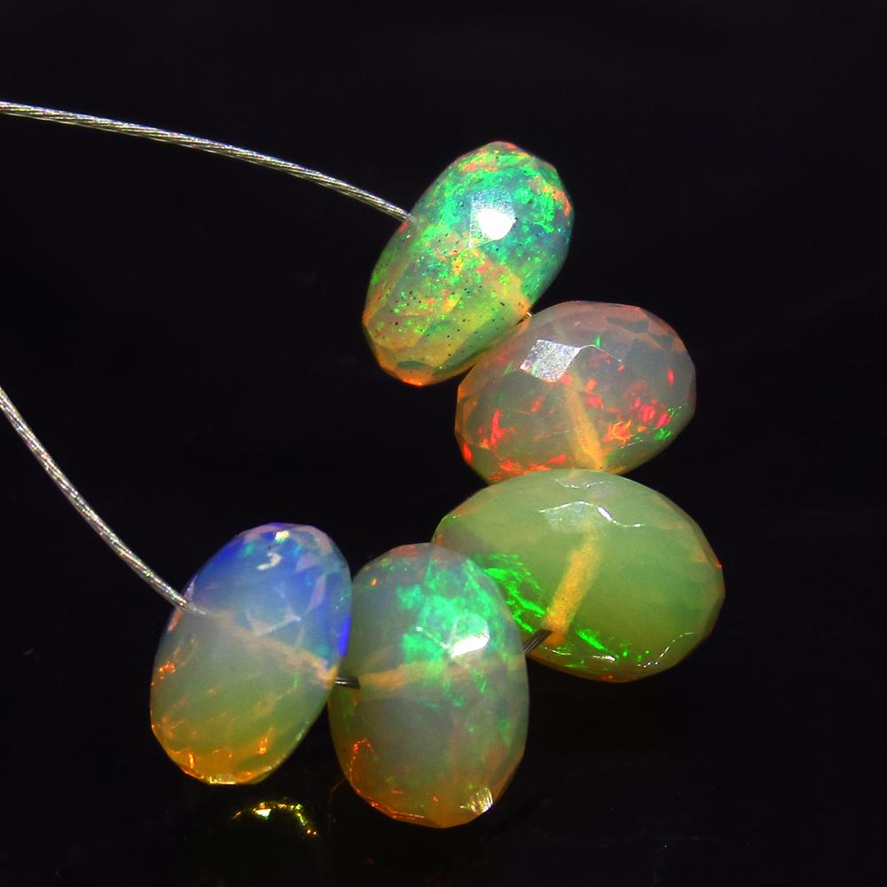 6.50 Ct Natural 5 Ethiopian Drilled Faceted Fire Opal: No Reserve! Title: 6.50 Ct Natural 5 Ethiopian Drilled Faceted Fire Opal Beads Clarity: Transparent Gemstone: Natural Faceted Fire Opal Beads Carat Weight: 6.50 Size/Dimensions: 7.20 to 8.30 mm / 5 PC