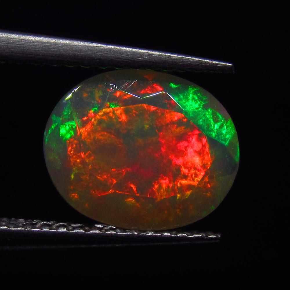 1.92 Ct Natural Multi-Color Faceted Fire Opal Oval Cut (1 of 3)