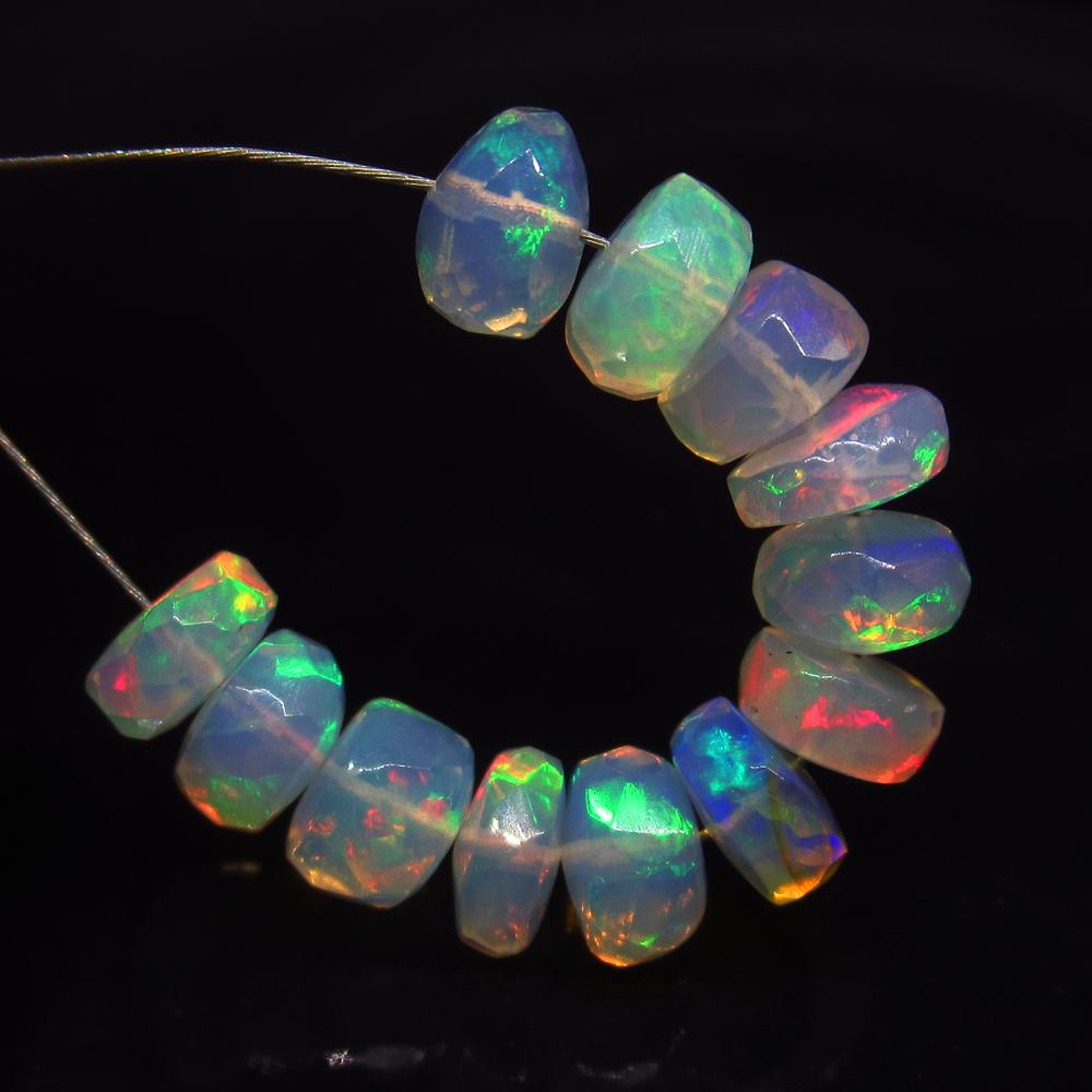 6.50 Ct Natural 12 Ethiopian Drilled Faceted Fire Opal: No Reserve! Title: 6.50 Ct Natural 12 Ethiopian Drilled Faceted Fire Opal Beads Clarity: Transparent Gemstone: Natural Faceted Fire Opal Beads Carat Weight: 6.50 Size/Dimensions: 5.60 to 5.80 mm / 12 