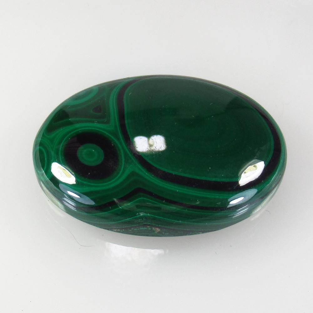 104.88 Ct Natural Green Malachite 39x27mm Oval Cab: No Reserve! Title: 104.88 Ct Natural Green Malachite 39x27mm Oval Cab Clarity: Opaque Gemstone: Natural Malachite Carat Weight: 104.88 Size/Dimensions: 39.00 x 27.00 x 7.70 mm Additional Information: